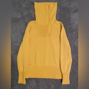 Zipper turtleneck sweater.